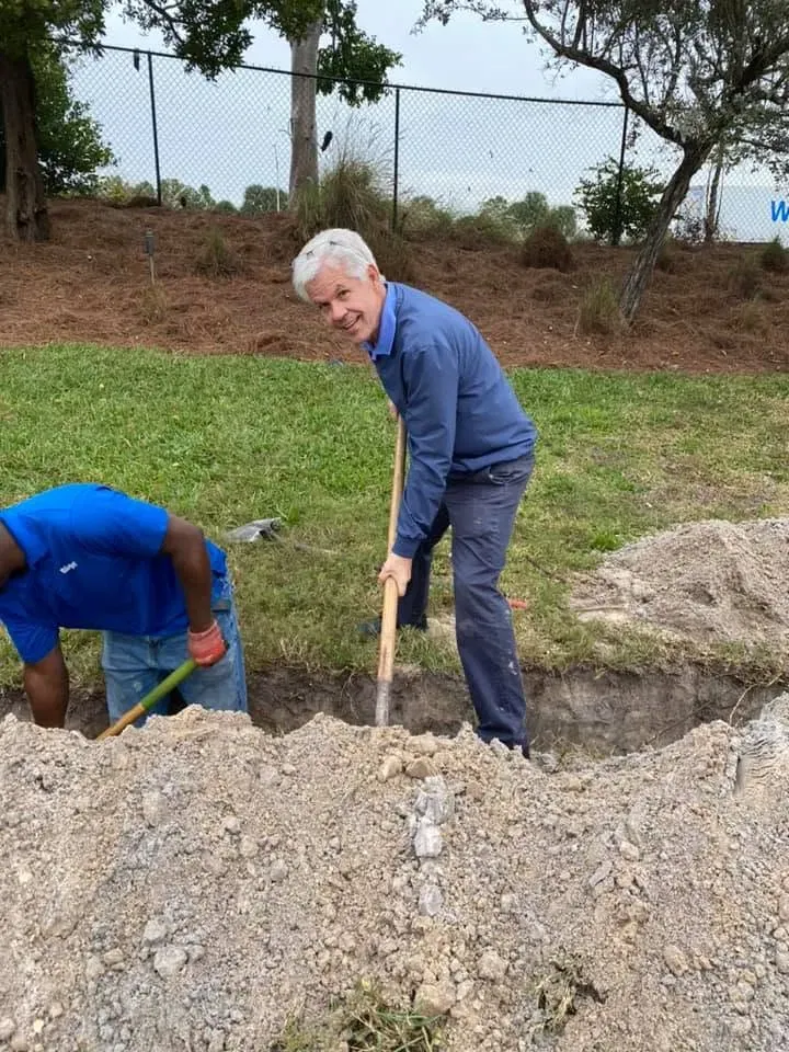 Founder Van Franey digging on a job site
