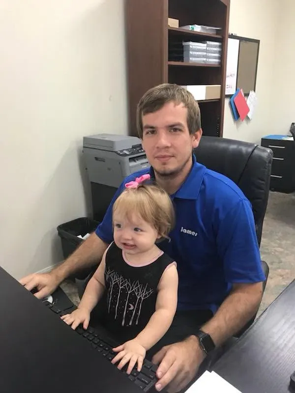 James, second generation, with his daughter at the office