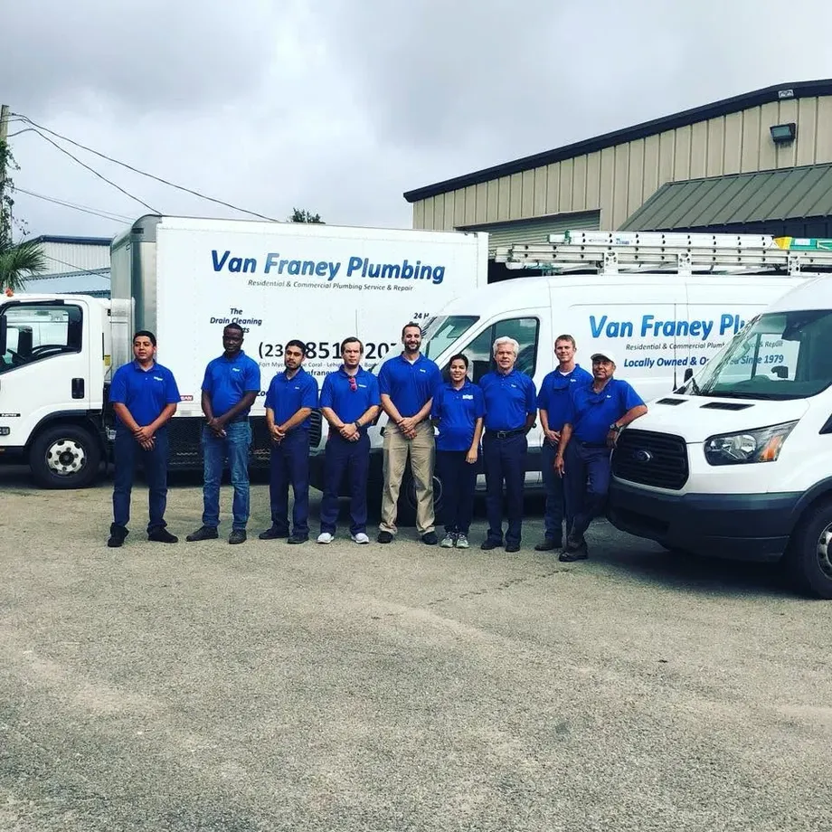 The Van Franey Plumbing crew in front of the fleet